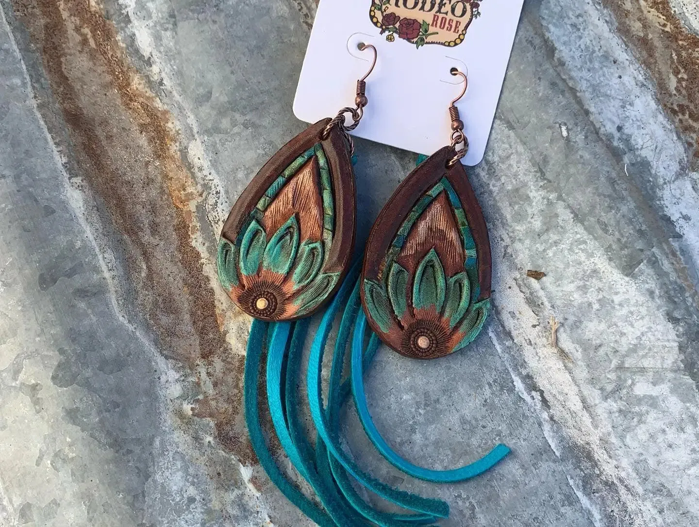 The Tad Hand Tooled Leather Earrings with Turquoise Border and Deerskin Fringe